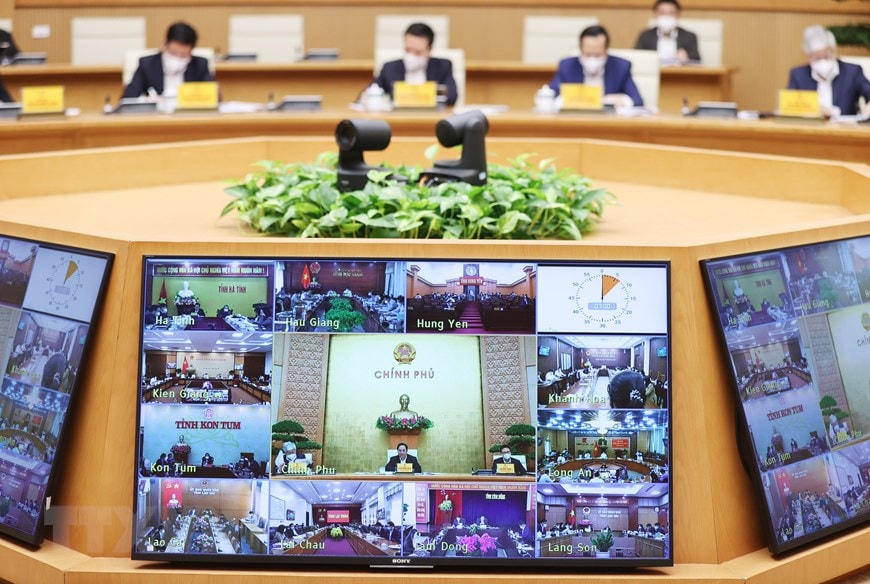 Điểm cầu trực tuyến tại các tỉnh, thành phố tham dự cuộc họp với Ban Chỉ đạo. (Ảnh: Dương Giang/TTXVN).