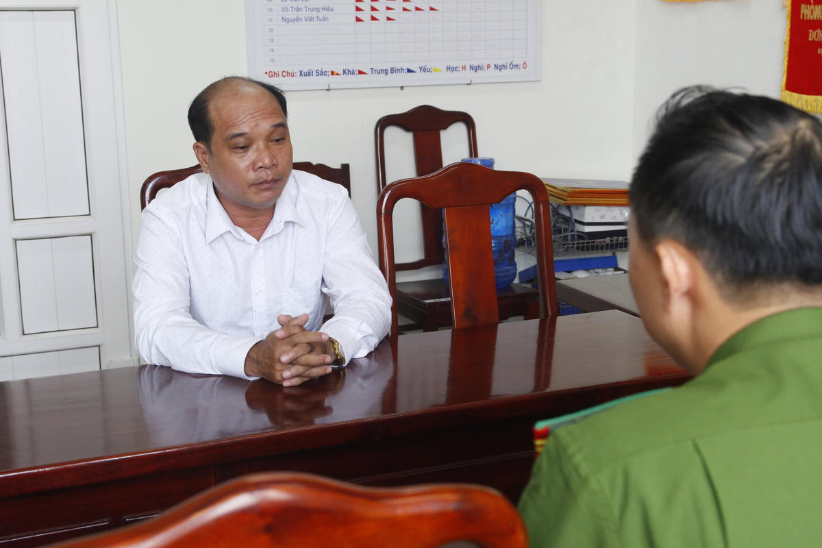 Ông Phan Văn Chinh tại cơ quan công an.