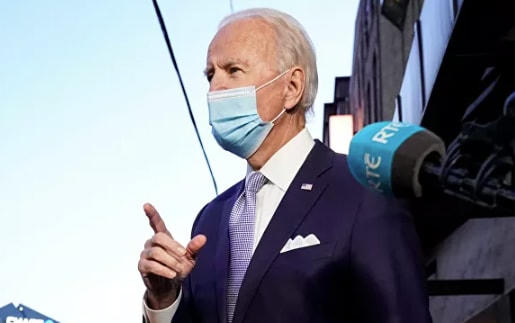 Ông Biden trả lời phỏng vấn truyền thông. Ảnh: Reuters.