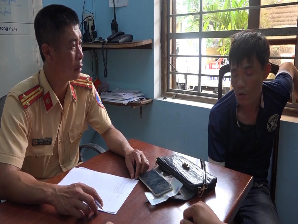 Trần Quốc Đạt tại cơ quan Công an.