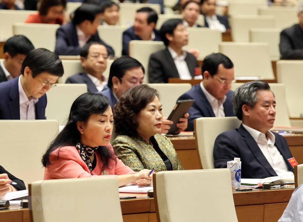 Các đại biểu dự Hội nghị tại điểm cầu chính - Phòng họp Diên Hồng, Nhà Quốc hội (Hà Nội), sáng 28/3/2021. (Ảnh: Thống Nhất/TTXVN).