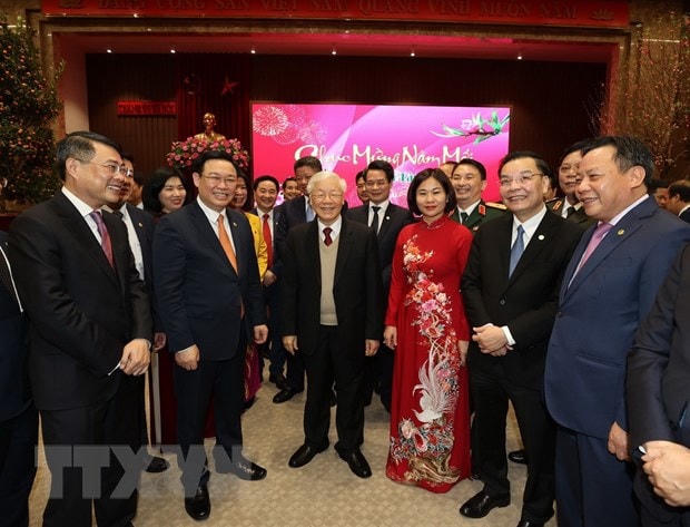 Tổng Bí thư, Chủ tịch nước Nguyễn Phú Trọng với các đại biểu tại Thành uỷ Hà Nội. (Ảnh. Trí Dũng/TTXVN).