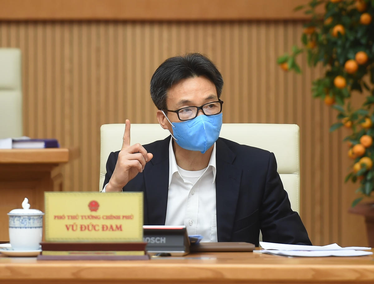 Phó Thủ tướng Chính phủ Vũ Đức Đam, Trưởng Ban Chỉ đạo quốc gia phòng chống dịch Covid-19 phát biểu tại cuộc họp. Ảnh: VGP/Quang Hiếu.  