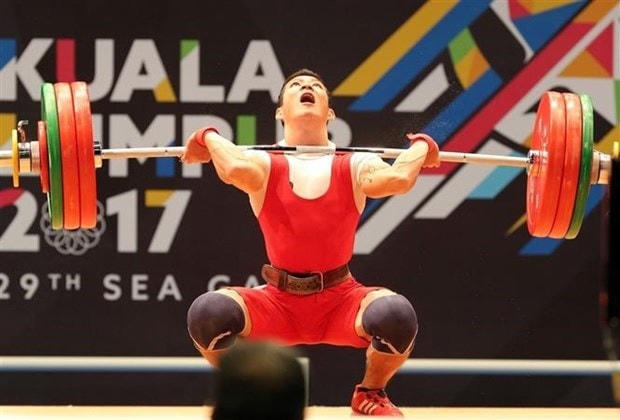 Vận động viên cử tạ Thạch Kim Tuấn tại SEA Games 29 ở Malaysia, tháng 8/2017. Ảnh: Quốc Khánh/TTXVN.  