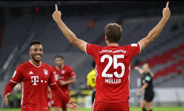 Mueller ăn mừng sau khi nhân đôi cách biệt cho Bayern. (Nguồn: FcBayern).