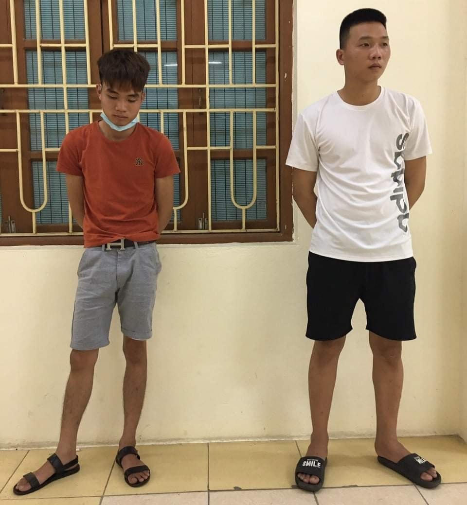 Nguyễn Hữu Đức và Đặng Hữu Tuấn tại cơ quan điều tra.