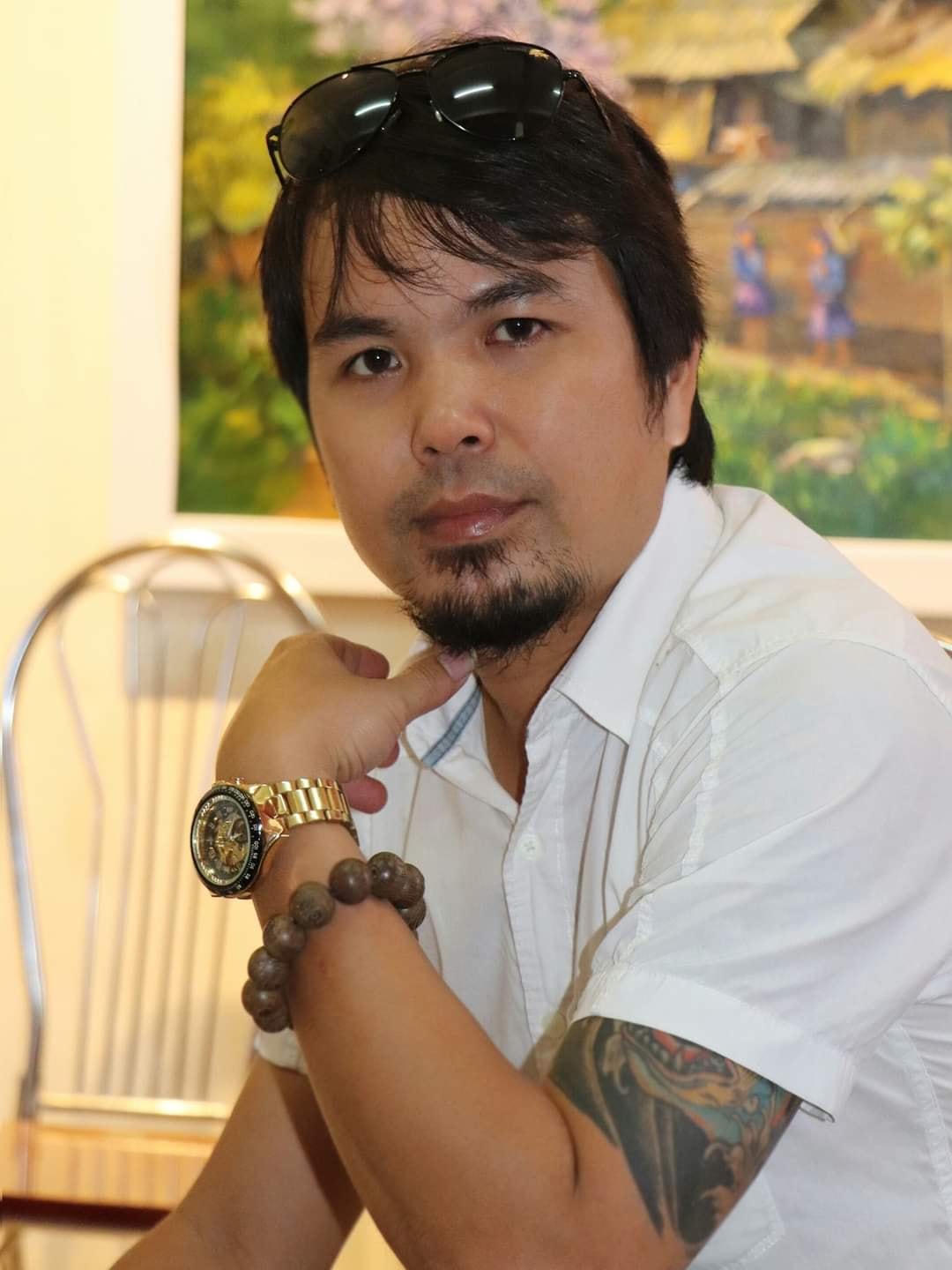 Họa sĩ Lê Vinh.