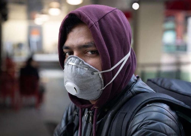 Nhiều thành phố của Mỹ đã áp dụng quy định đeo khẩu trang bắt buộc để ngăn Covid-19 lây lan. (Ảnh: Morning Times).