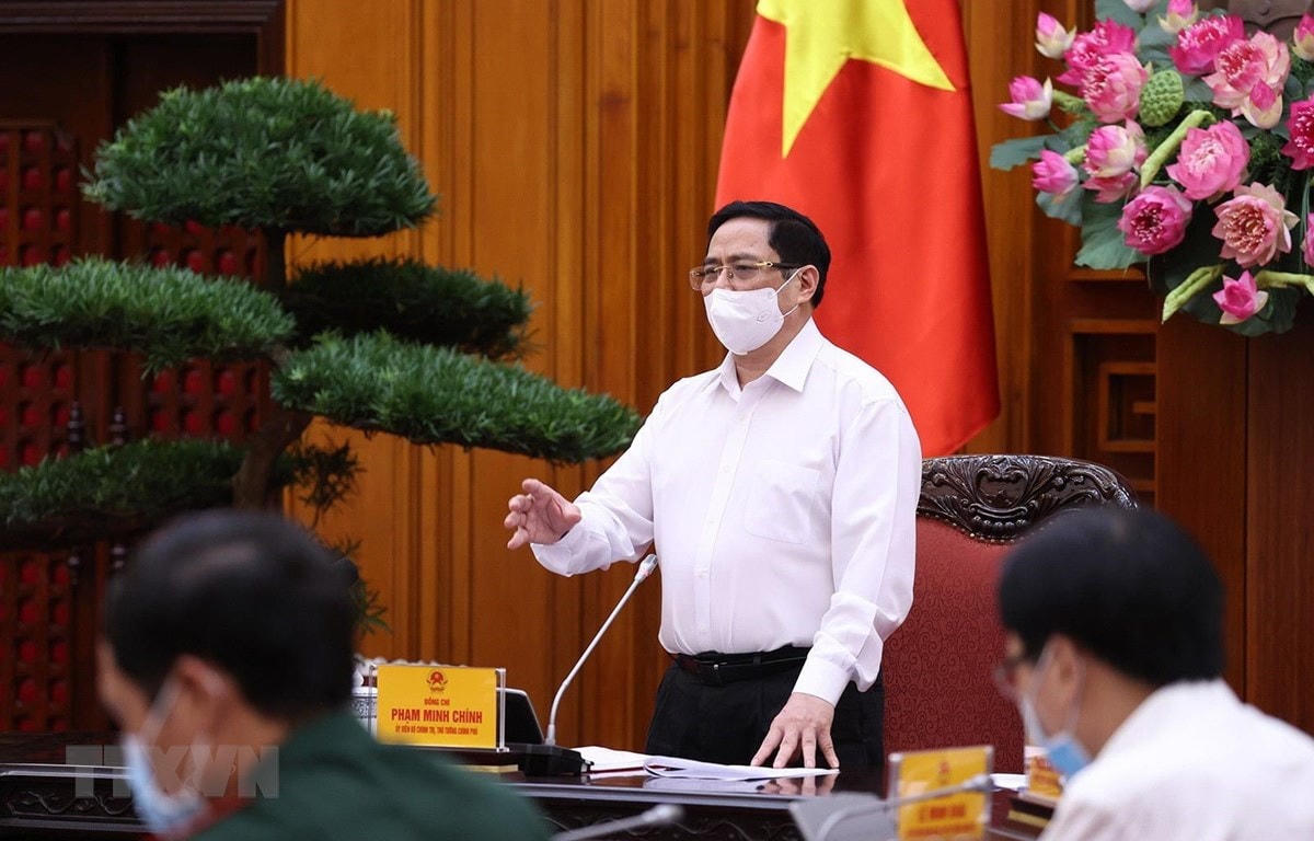 Thủ tướng Phạm Minh Chính yêu cầu thực hiện nghiêm túc các biện pháp phòng, chống dịch trong các khu công nghiệp. Ảnh: Dương Giang/TTXVN.