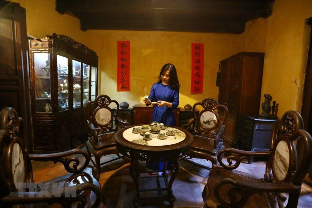 Không gian sinh hoạt của một gia đình Hà Nội xưa. (Nguồn: TTXVN).