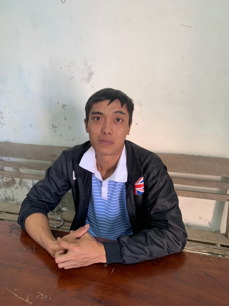 Đối tượng Trương Đức Quốc tại cơ quan Công an.