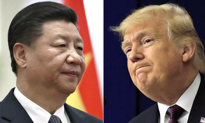 Chủ tịch Trung Quốc Tập Cận Bình (trái) và Tổng thống Mỹ Donald Trump. Ảnh: AP.  