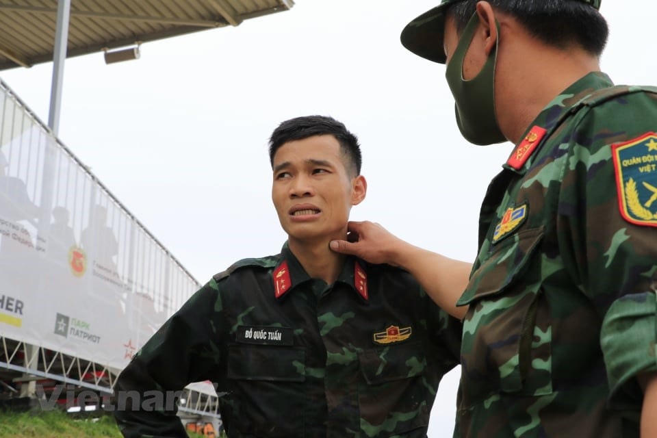 Lái xe Đỗ Quốc Tuấn của kíp xe số 2, người đã có những cú bứt tốc ngoạn mục. (Ảnh: Trần Hiếu/Vietnam+).