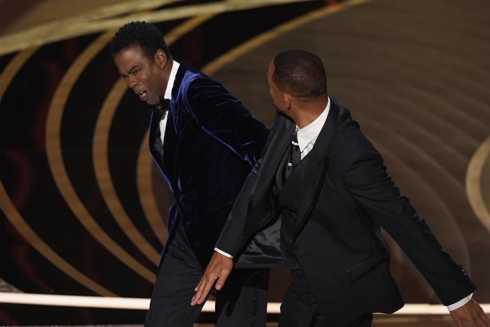Cú tát của Will Smith dành cho Chris Rock đã đi vào lịch sử điện ảnh thế giới. Ảnh: AP.