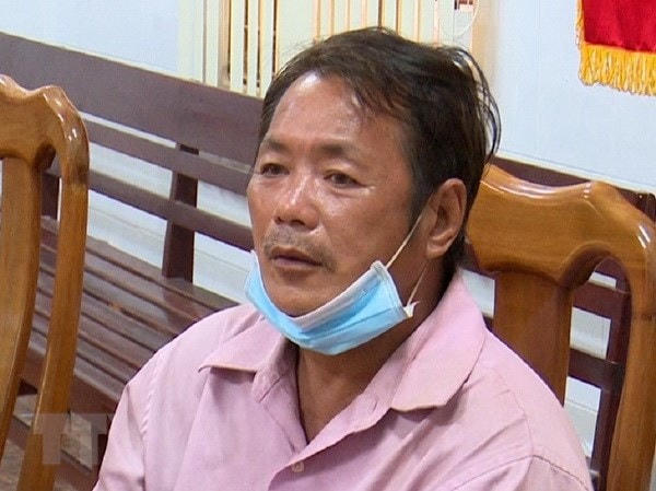 Đối tượng Nguyễn Văn Dũng tại cơ quan Công an. (Ảnh: TTXVN phát).