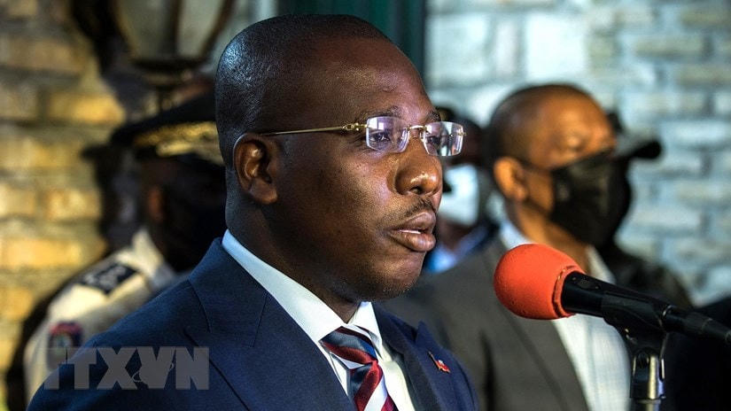 Thủ tướng lâm thời Haiti Claude Joseph trong cuộc họp báo ở Port-au Prince ngày 11/7/2021. (Ảnh: AFP/TTXVN).