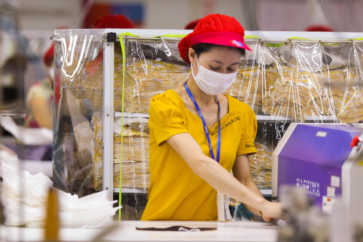 Năm 2022 được cho là năm kinh tế phục hồi mạnh mẽ . Ảnh: Quang Vinh