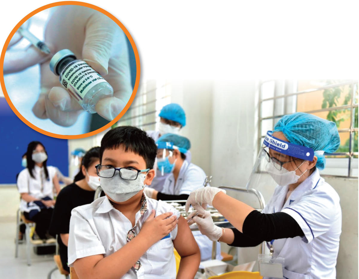 Tiêm vaccine phòng Covid-19 là phương án tốt nhất để trẻ em có thể sớm được trở lại trường học. Ảnh: Quang Vinh