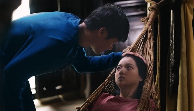 Quang Tuấn và Lâm Thanh Mỹ trong phim.