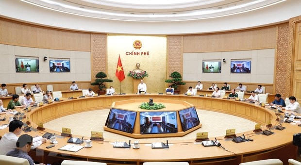 Thủ tướng Nguyễn Xuân Phúc chủ trì họp Thường trực Chính phủ về phòng chống dịch Covid-19. (Ảnh: TTXVN).