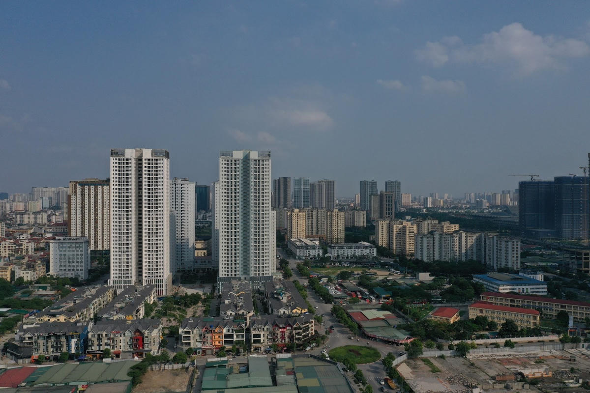 Sau khi ngân hàng siết cho vay bất động sản, dự báo thị trường này sẽ hạ nhiệt.        Ảnh: Quang Vinh.