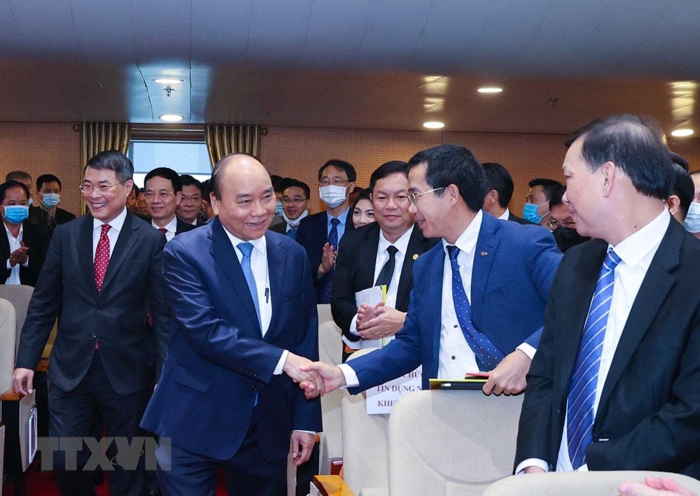 Thủ tướng Nguyễn Xuân Phúc với các đại biểu dự hội nghị. (Ảnh: Thống Nhất/TTXVN).