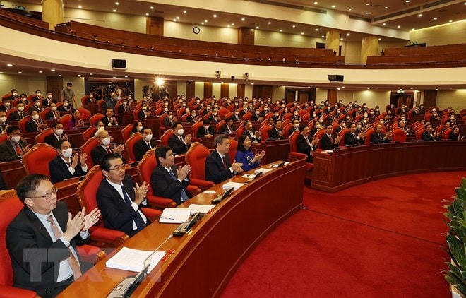 Lãnh đạo Đảng, Nhà nước và các đại biểu dự bế mạc hội nghị. Ảnh: Trí Dũng/TTXVN.