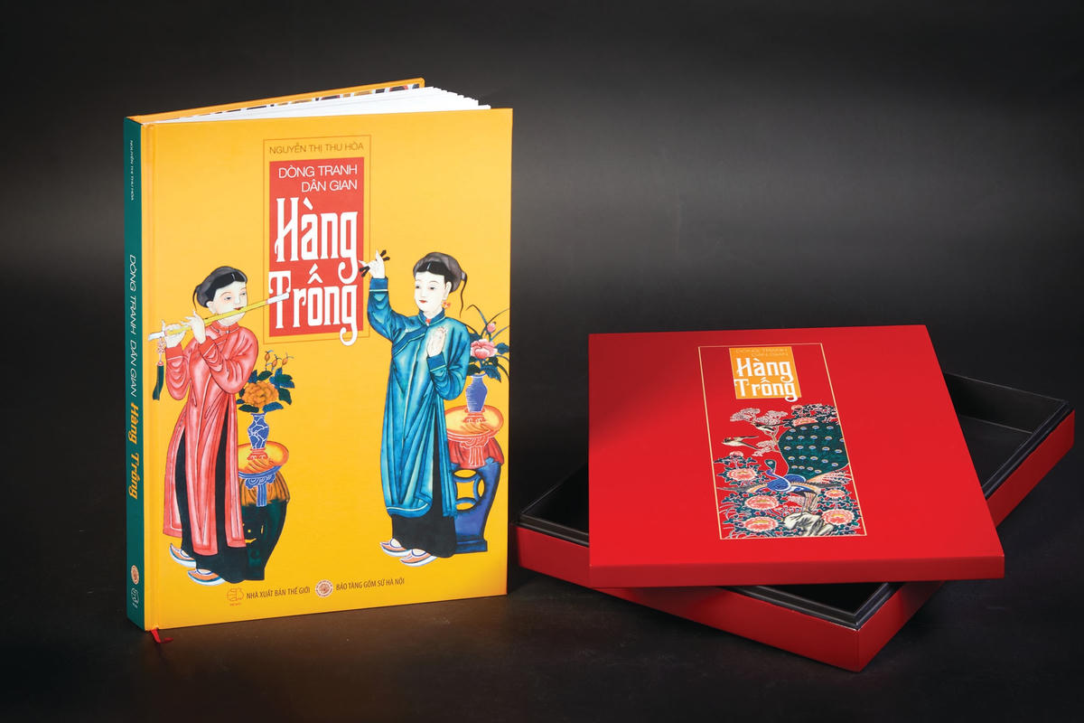 Đưa họa tiết tranh dân gian Hàng Trống trên hộp sơn mài.  