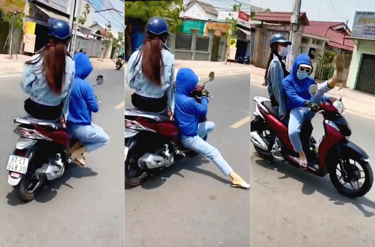 Vừa chạy xe vừa "múa". Ảnh: cắt từ  video.