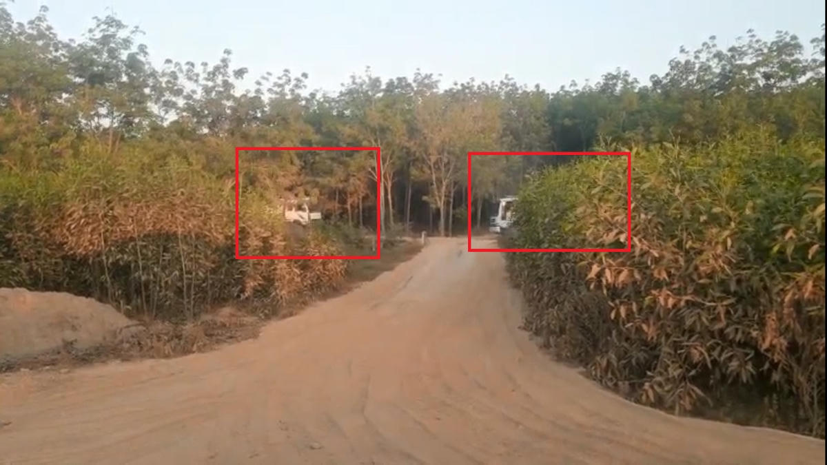 Xe ben vào chở cát khi thấy phóng viên chụp hình thì không dám chạy ra (khoanh đỏ)