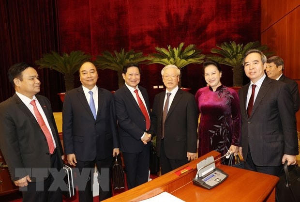 Tổng Bí thư, Chủ tịch nước Nguyễn Phú Trọng, Thủ tướng Chính phủ Nguyễn Xuân Phúc, Chủ tịch Quốc hội Nguyễn Thị Kim Ngân và các đại biểu dự bế mạc Hội nghị. (Ảnh: Trí Dũng/TTXVN).