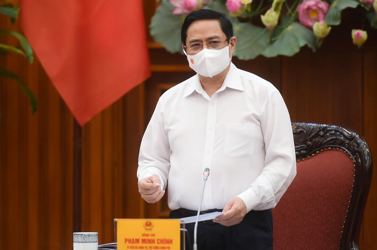 Thủ tướng Phạm Minh Chính chủ trì cuộc họp Thường trực Chính phủ về phòng, chống dịch Covid-19 diễn ra sáng 26/4. Ảnh VGP.