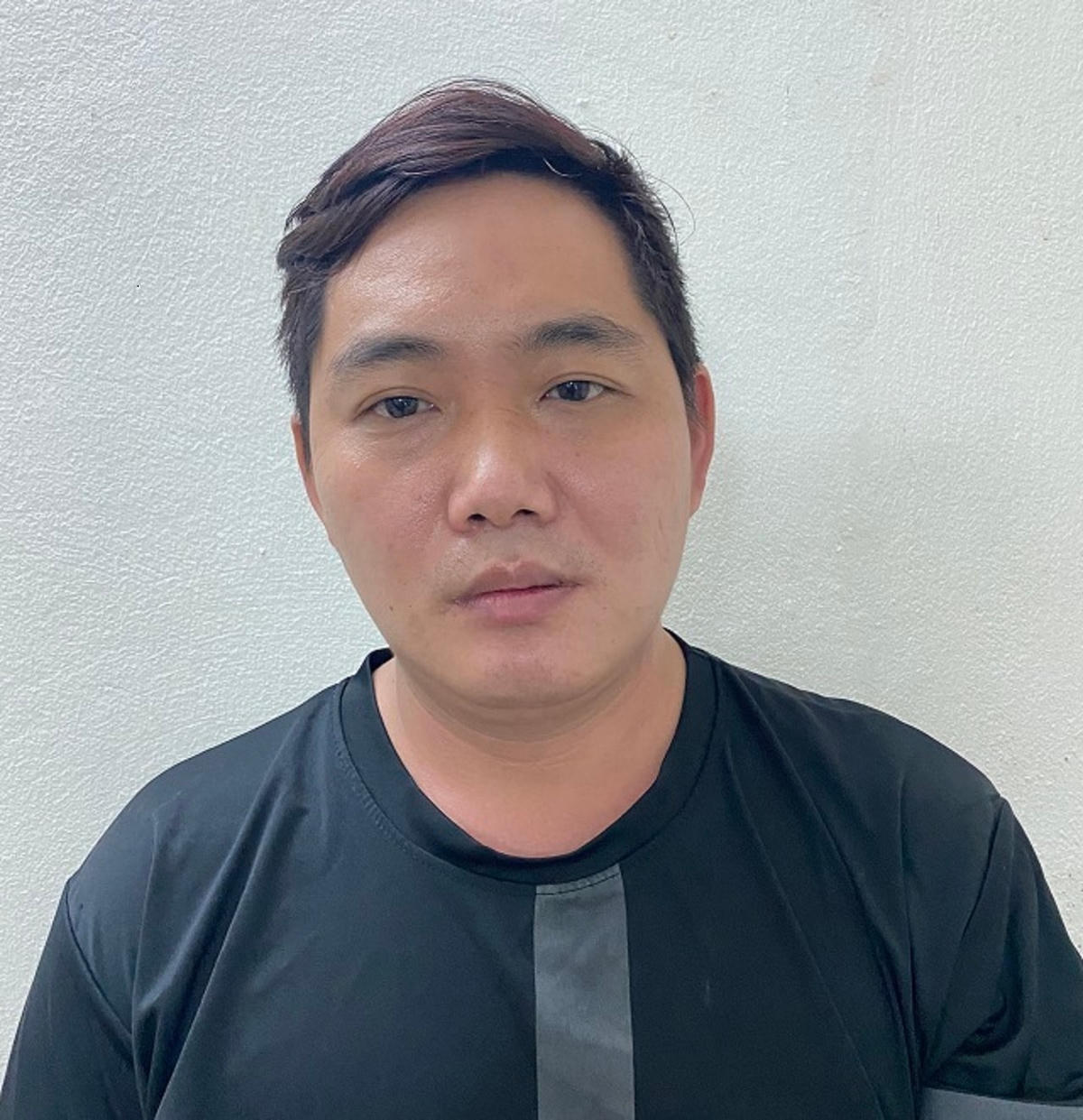 Đối tượng Lê Văn Minh tại cơ quan điều tra. Ảnh CA cung cấp.