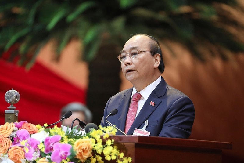 Thủ tướng Nguyễn Xuân Phúc trình bày Diễn văn khai mạc Đại hội đại biểu toàn quốc lần thứ XIII của Đảng. Ảnh: Quang Vinh.