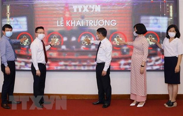 Lãnh đạo TTXVN khai trương trang thông tin đặc biệt về bầu cử Quốc hội và HĐND. Ảnh: TTXVN.  