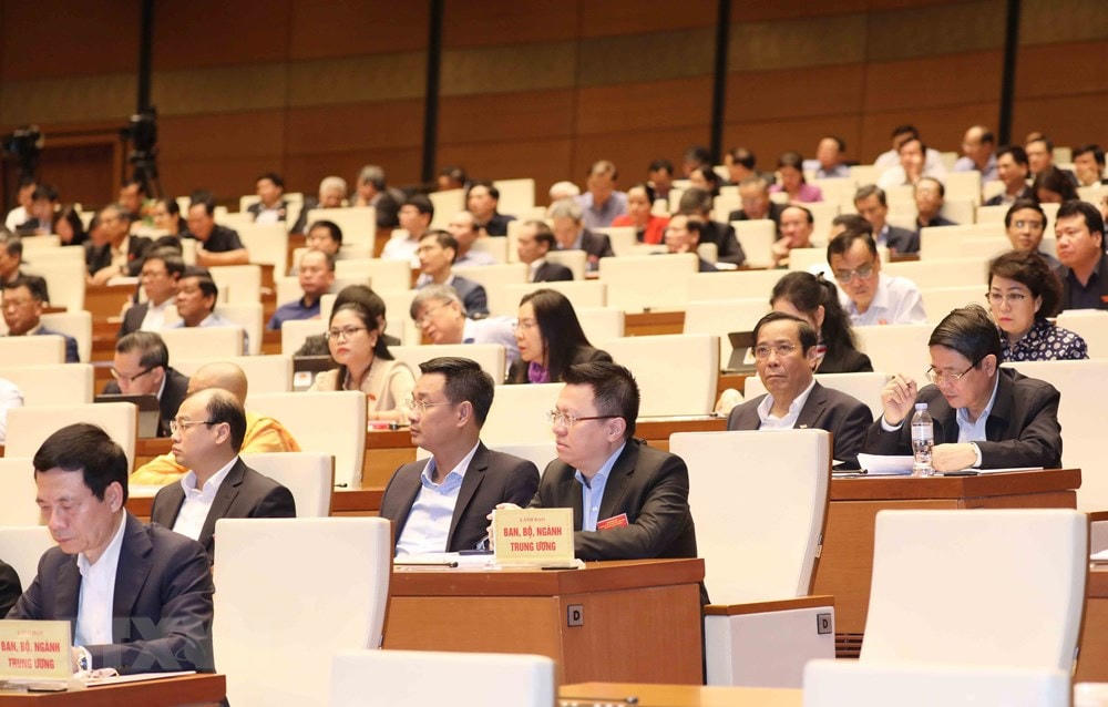 Các đại biểu dự Hội nghị tại điểm cầu chính - Phòng họp Diên Hồng, Nhà Quốc hội (Hà Nội), sáng 28/3/2021. (Ảnh: Phương Hoa/TTXVN).