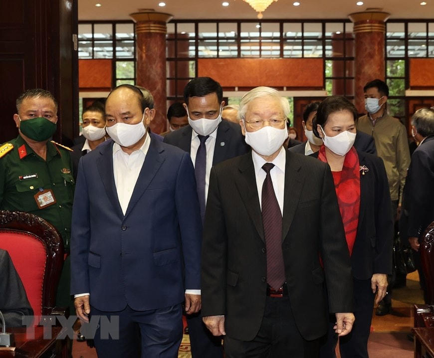 Tổng Bí thư, Chủ tịch nước Nguyễn Phú Trọng, Thủ tướng Chính phủ Nguyễn Xuân Phúc, Chủ tịch Quốc hội Nguyễn Thị Kim Ngân đến dự Hội nghị. Ảnh: TTXVN.  
