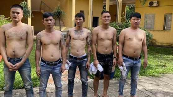 Các đối tượng bị bắt giữ tại cơ quan chức năng. (Ảnh: TTXVN phát).