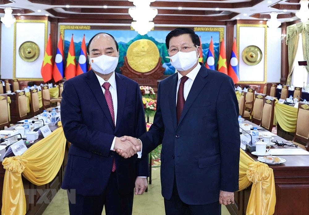 Chủ tịch nước Nguyễn Xuân Phúc và Tổng Bí thư, Chủ tịch nước Lào Thongloun Sisoulith tại buổi hội đàm. (Ảnh: Thống Nhất/TTXVN).