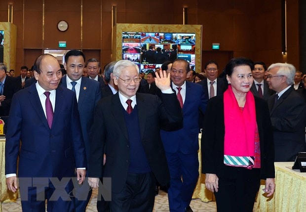 Tổng Bí thư, Chủ tịch nước Nguyễn Phú Trọng; Thủ tướng Nguyễn Xuân Phúc; Chủ tịch Quốc hội Nguyễn Thị Kim Ngân cùng các đại biểu dự Hội nghị Chính phủ với địa phương sáng 28/12. (Ảnh: TTXVN).