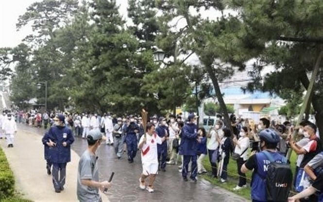 Rước đuốc Olympic tại Saitama, Nhật Bản, ngày 7/7. (Ảnh: Kyodo/TTXVN).