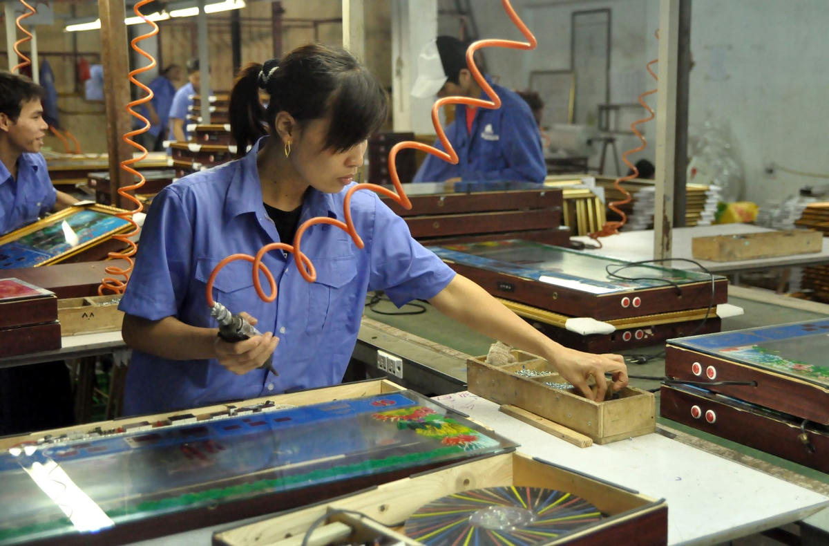 Doanh nghiệp rất cần sự hỗ trợ để sản xuất, kinh doanh, thúc đẩy tăng trưởng. Ảnh: Quang Vinh.
