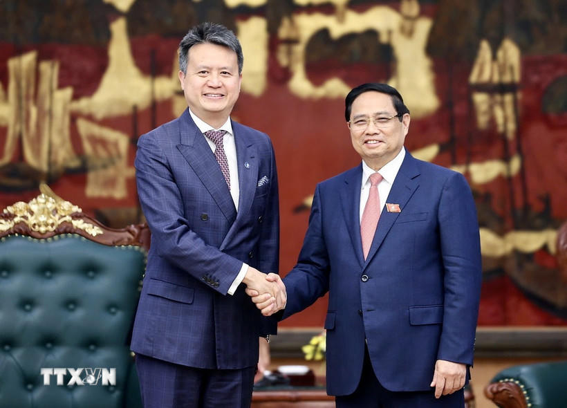  Thủ tướng Phạm Minh Chính tiếp ông Daren Tang, Tổng giám đốc Tổ chức Sở hữu trí tuệ thế giới (WIPO). (Ảnh: Dương Giang/TTXVN).  