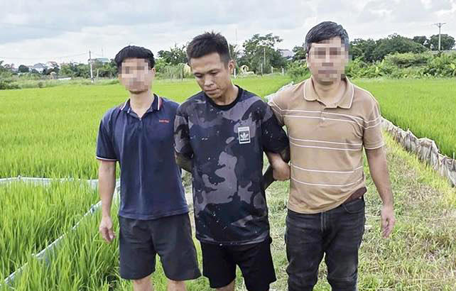 Đối tượng Ngô Quang Vỹ bị bắt khi đang chạy trốn. Ảnh: CAHT