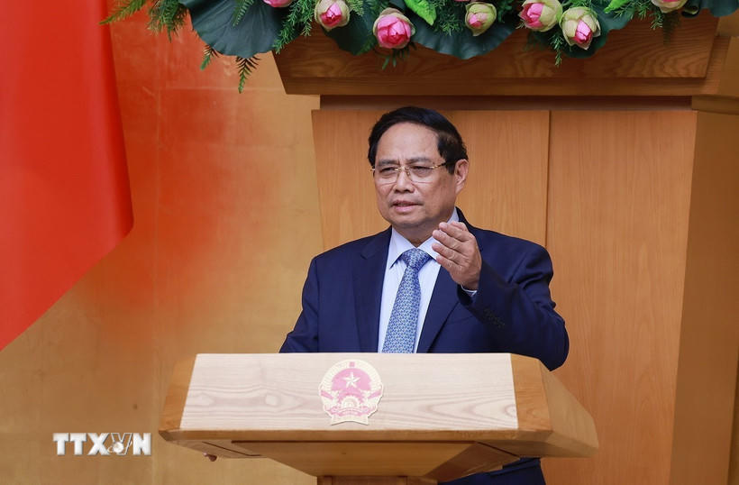 Thủ tướng Phạm Minh Chính chủ trì họp đánh giá kết quả vận hành mô hình chính quyền địa phương hai cấp. (Ảnh: Dương Giang/TTXVN).