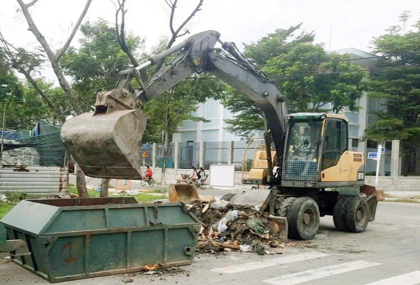 Các điểm tập kết rác trong khu dân cư được dọn đẹp. Ảnh: Nguyễn Tú.