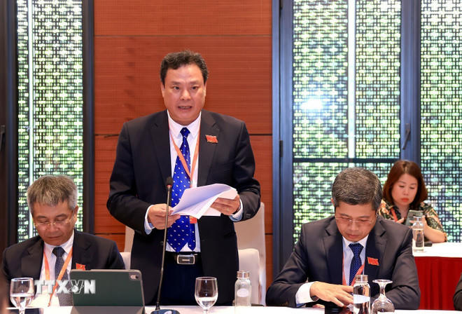 Các đại biểu thảo luận tại tổ số 6 chiều 12/10. (Ảnh: Tuấn Anh/TTXVN)