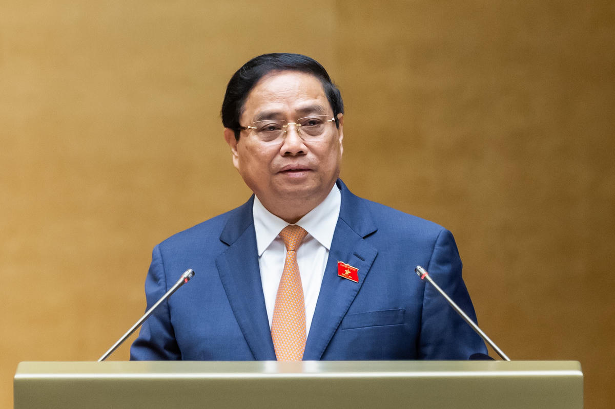 Thủ tướng Phạm Minh Chính báo cáo&nbsp;kết quả thực hiện Kế hoạch phát triển kinh tế - xã hội năm 2025 và 5 năm 2021 - 2025; dự kiến kế hoạch phát triển kinh tế - xã hội năm 2026. Ảnh: Quang Vinh.