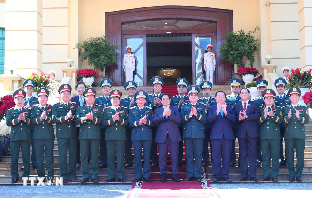 Thủ tướng Phạm Minh Chính và các đại biểu. (Ảnh: Trọng Đức/TTXVN)