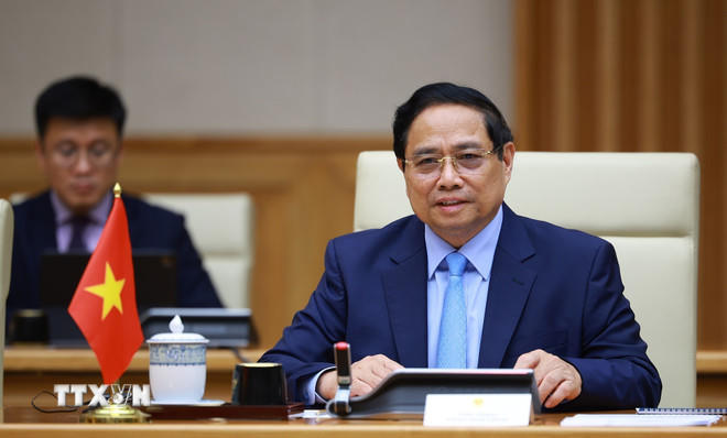 Thủ tướng Phạm Minh Chính hội kiến Tổng thống Cộng hòa Nam Phi Matamela Cyril Ramaphosa. (Ảnh: Dương Giang/TTXVN)